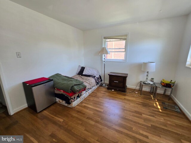 105 S Iris St, Alexandria, VA 22304 - bedroom featuring wood finished floors and baseboards