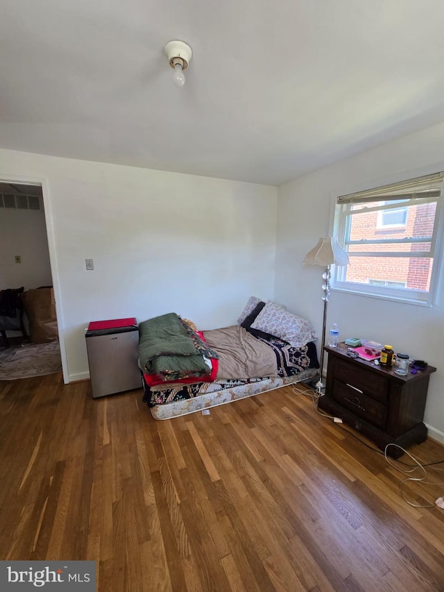105 S Iris St, Alexandria, VA 22304 - bedroom featuring wood finished floors and baseboards