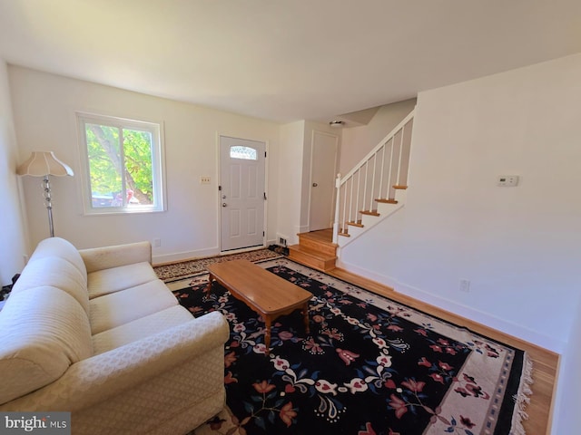 105 S Iris St, Alexandria, VA 22304 - living room featuring stairway, baseboards, and wood finished floors
