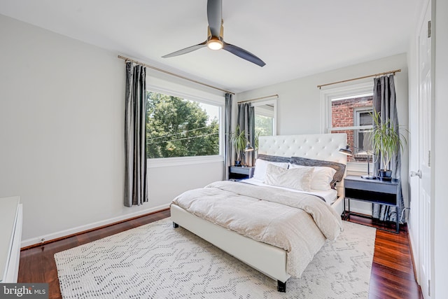 236 Nicholson St NE, Washington, DC 20011 - bedroom featuring baseboards, wood finished floors, and a ceiling fan