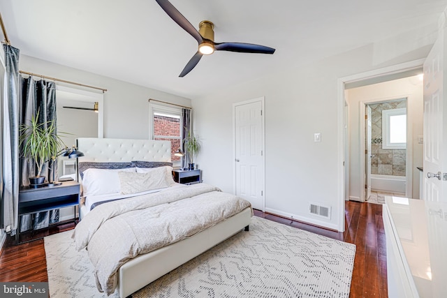 236 Nicholson St NE, Washington, DC 20011 - bedroom featuring visible vents, baseboards, a ceiling fan, and dark wood-style floors
