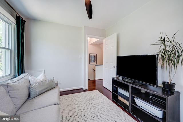 236 Nicholson St NE, Washington, DC 20011 - living area with baseboards and dark wood-style flooring