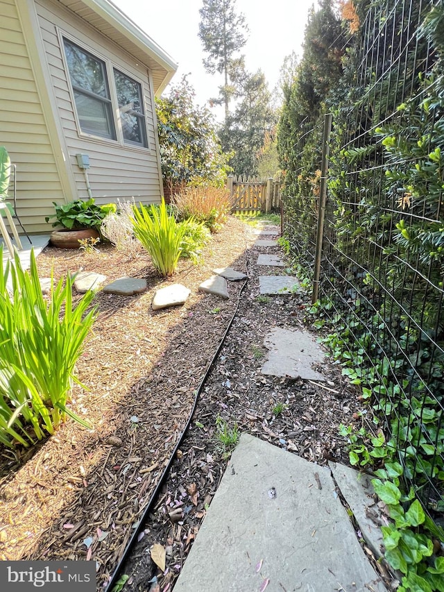 view of yard with fence