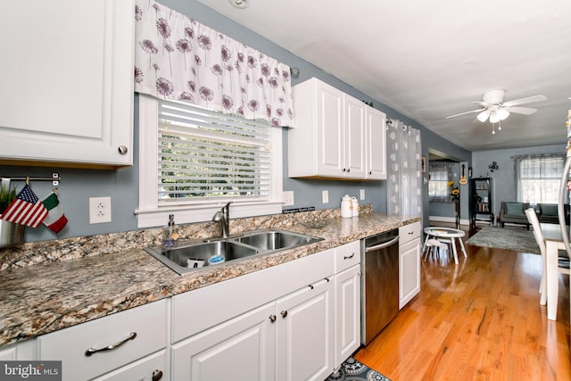 208 Veterans Ave, West Berlin, NJ 08091 - kitchen with dishwasher, a sink, white cabinetry, and light wood-style floors