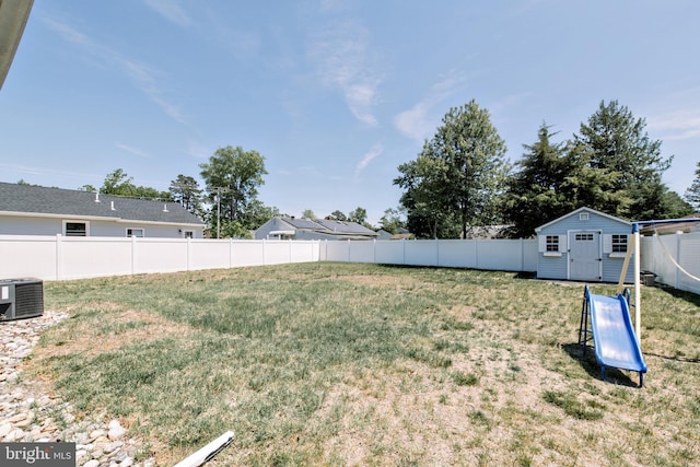208 Veterans Ave, West Berlin, NJ 08091 - view of yard featuring central AC unit, a storage shed, and an outdoor structure