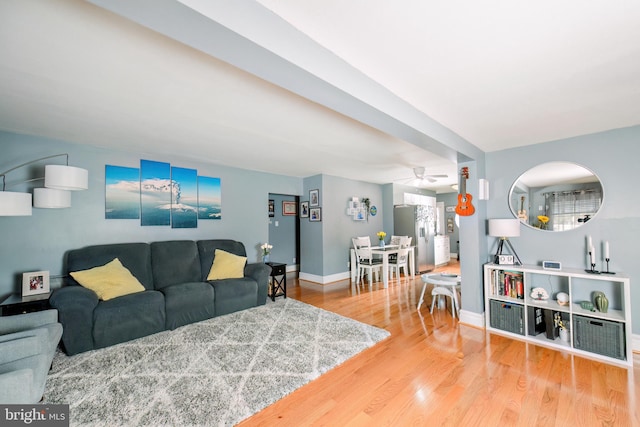208 Veterans Ave, West Berlin, NJ 08091 - living room featuring wood finished floors, ceiling fan, and baseboards
