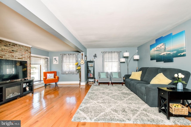 208 Veterans Ave, West Berlin, NJ 08091 - living area with plenty of natural light, wood finished floors, and baseboards