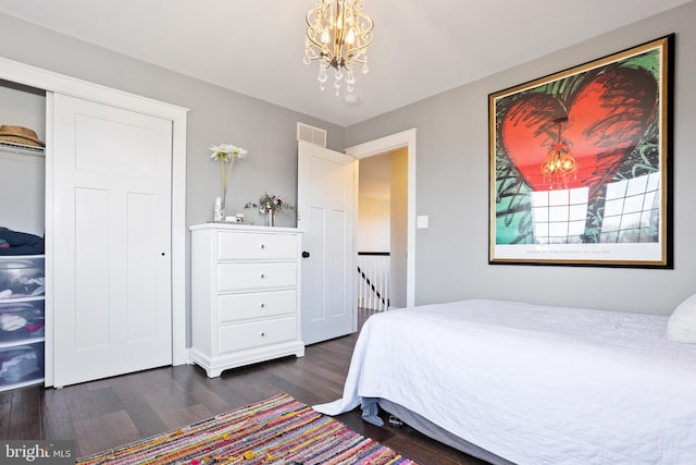 33 Docwill Dr, Barto, PA 19504 - bedroom with dark wood-style flooring, visible vents, and an inviting chandelier