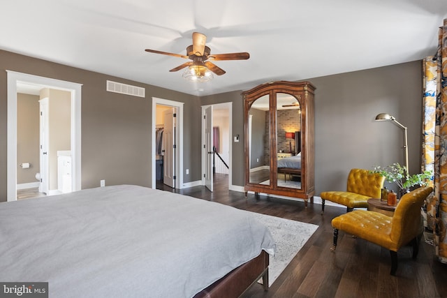 33 Docwill Dr, Barto, PA 19504 - bedroom with baseboards, dark wood finished floors, visible vents, and a walk in closet