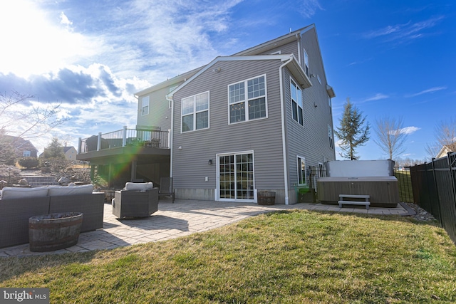 33 Docwill Dr, Barto, PA 19504 - rear view of house with a yard, a hot tub, a fenced backyard, an outdoor hangout area, and a patio area