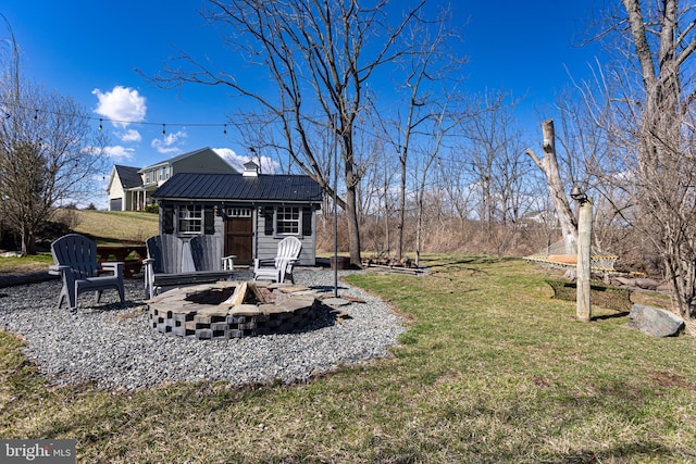 33 Docwill Dr, Barto, PA 19504 - view of yard featuring an outdoor structure and a fire pit