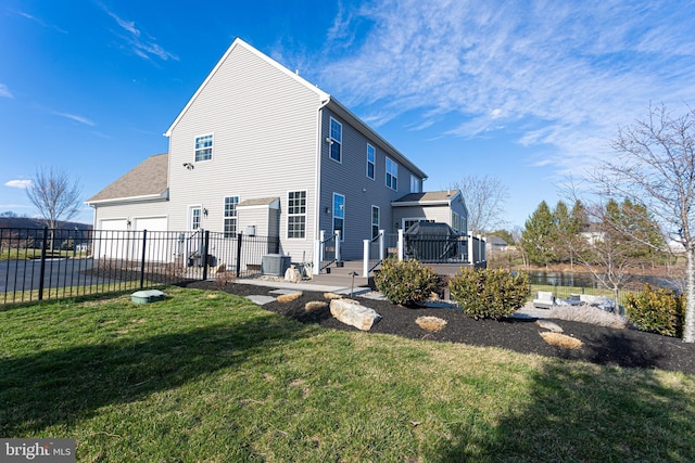 33 Docwill Dr, Barto, PA 19504 - back of house featuring fence, driveway, a wooden deck, cooling unit, and a lawn