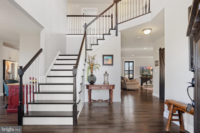 33 Docwill Dr, Barto, PA 19504 - entrance foyer featuring a high ceiling, stairs, visible vents, baseboards, and dark wood-style floors