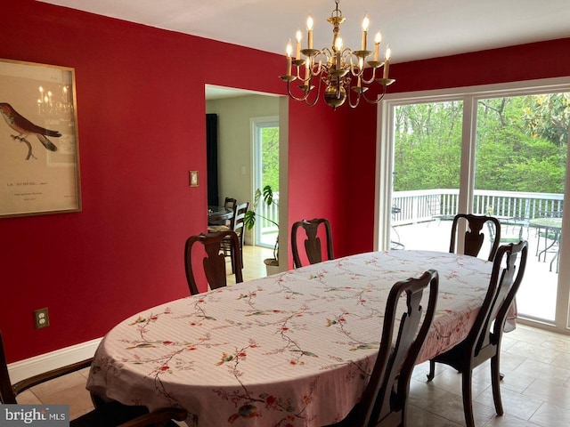 5 Garfield Ct, Gaithersburg, MD 20882 - dining area with a chandelier and baseboards