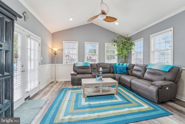 806 209th St, Pasadena, MD 21122 - living area with a ceiling fan, wood finished floors, lofted ceiling, ornamental molding, and baseboards