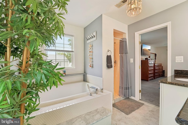 806 209th St, Pasadena, MD 21122 - full bath featuring a shower stall, vanity, a garden tub, and a chandelier