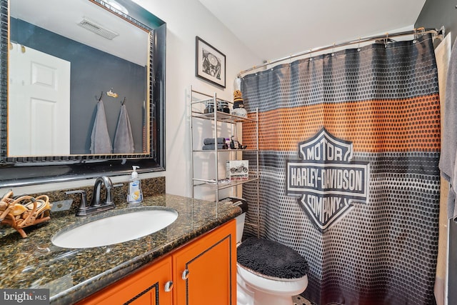 806 209th St, Pasadena, MD 21122 - bathroom featuring vanity and toilet