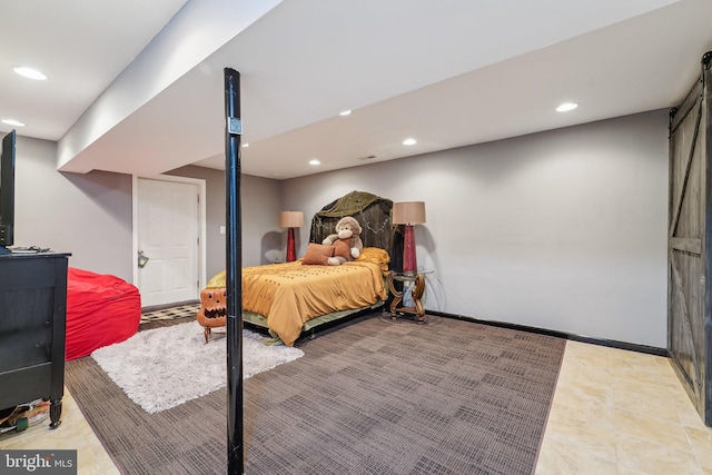 806 209th St, Pasadena, MD 21122 - bedroom featuring recessed lighting, a barn door, and baseboards