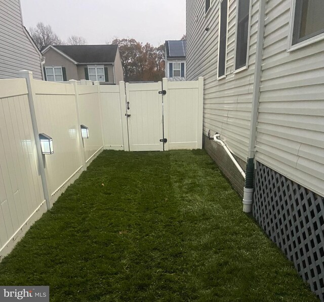806 209th St, Pasadena, MD 21122 - view of yard with a gate