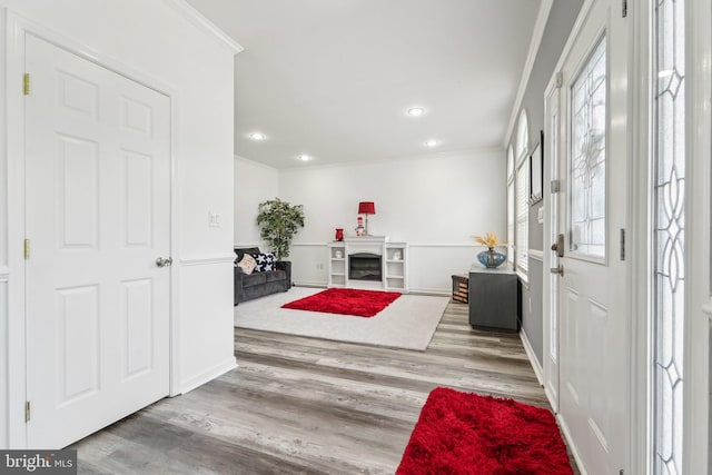 806 209th St, Pasadena, MD 21122 - foyer entrance with ornamental molding, wood finished floors, recessed lighting, and baseboards