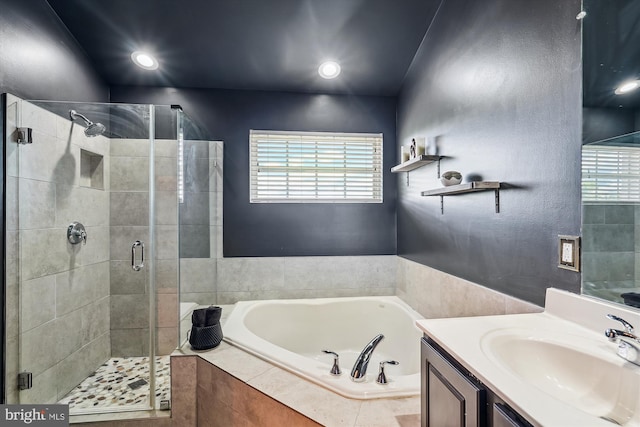 12205 Desoto Falls Ct, Bristow, VA 20136 - full bath with a bath, a stall shower, vanity, and recessed lighting