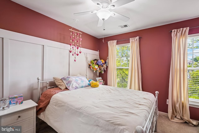 12205 Desoto Falls Ct, Bristow, VA 20136 - bedroom with multiple windows, carpet flooring, ceiling fan, and baseboards