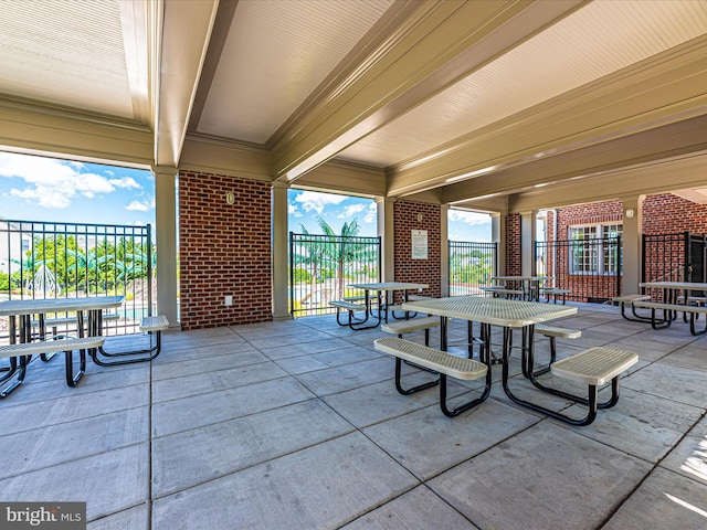 view of patio featuring outdoor dining area