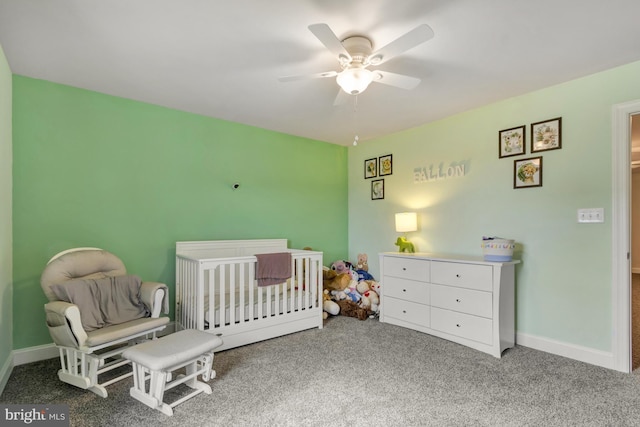 40 Doc Ct, Felton, DE 19943 - carpeted bedroom featuring ceiling fan, a nursery area, and baseboards