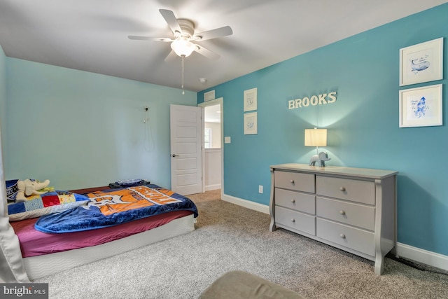 40 Doc Ct, Felton, DE 19943 - carpeted bedroom with baseboards and a ceiling fan