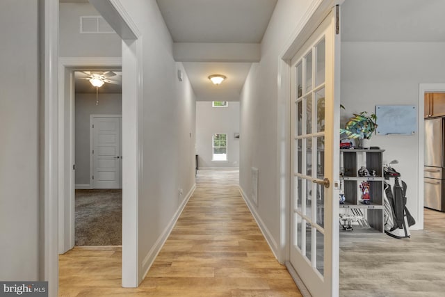 40 Doc Ct, Felton, DE 19943 - corridor featuring light wood finished floors, french doors, and baseboards