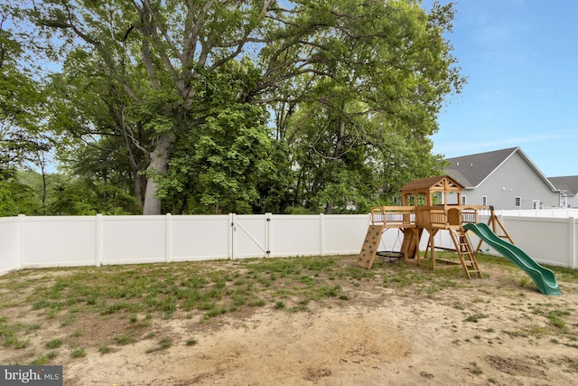 40 Doc Ct, Felton, DE 19943 - fenced backyard with a playground