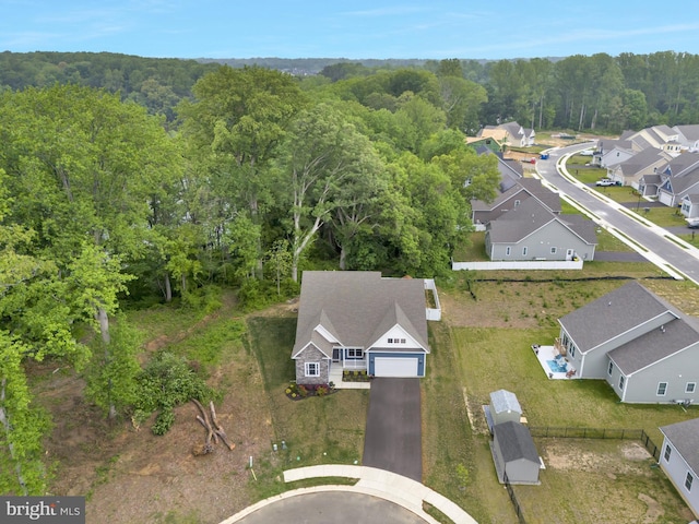 40 Doc Ct, Felton, DE 19943 - aerial view of property and surrounding area featuring a forest and nearby suburban area