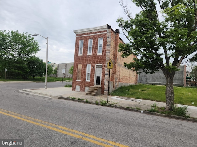 view of building exterior with entry steps