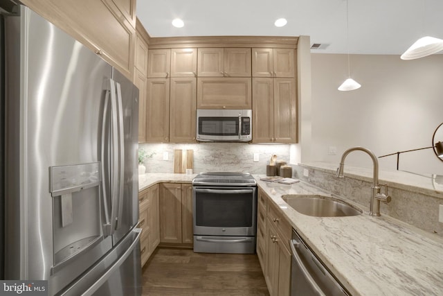 1332 Park Rd NW Unit A, Washington, DC 20010 - kitchen with stainless steel appliances, a sink, light stone counters, tasteful backsplash, and dark wood-style floors