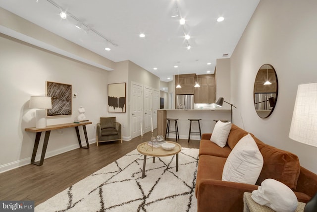 1332 Park Rd NW Unit A, Washington, DC 20010 - living room featuring dark wood finished floors, baseboards, rail lighting, and recessed lighting