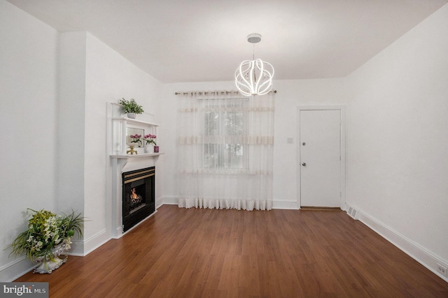 4558 Unruh Ave, Philadelphia, PA 19135 - unfurnished living room featuring wood finished floors, a high end fireplace, a chandelier, and baseboards