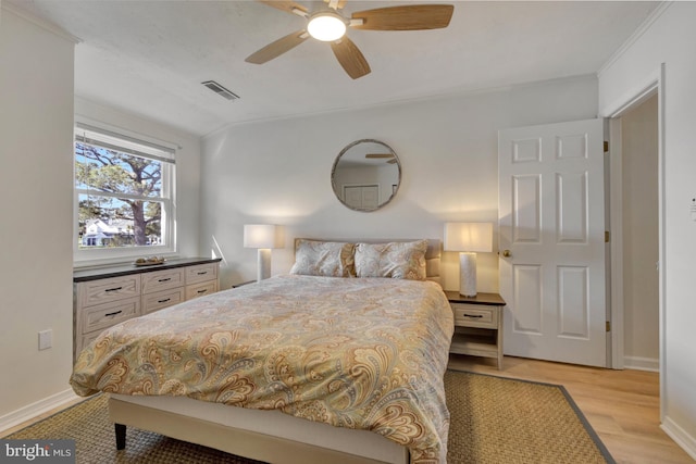 38072 Mockingbird Ln Unit 59, Selbyville, DE 19975 - bedroom with light wood-type flooring, baseboards, ceiling fan, and ornamental molding