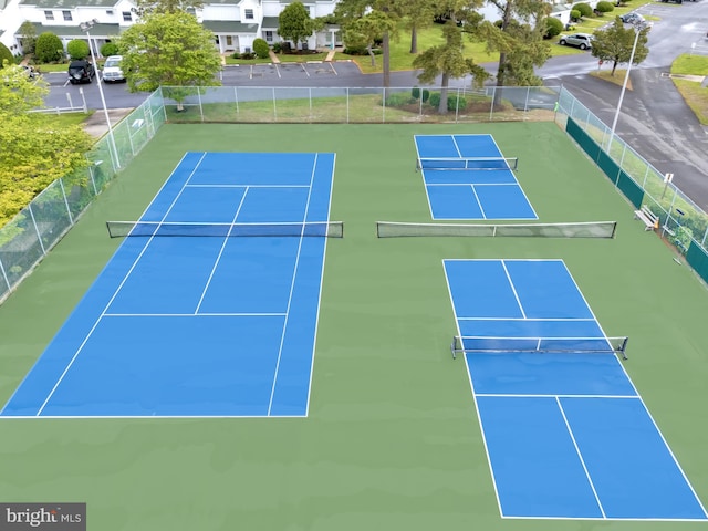 38072 Mockingbird Ln Unit 59, Selbyville, DE 19975 - view of tennis court featuring a residential view and community basketball court