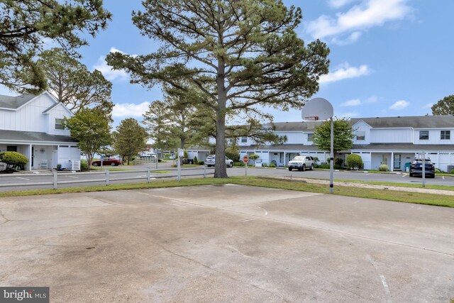 38072 Mockingbird Ln Unit 59, Selbyville, DE 19975 - view of concrete surface featuring a residential view