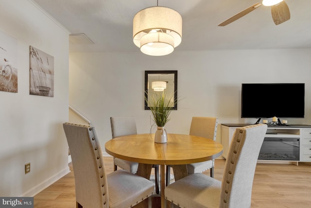38072 Mockingbird Ln Unit 59, Selbyville, DE 19975 - dining room featuring wood finished floors, ceiling fan, and baseboards