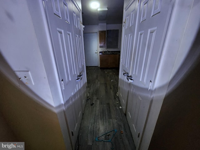 corridor with dark wood finished floors