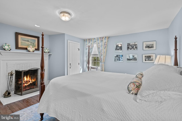 509 Ben Venue Rd, Flint Hill, VA 22627 - bedroom featuring wood finished floors and a fireplace