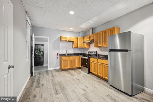 1534 S 19th St, Philadelphia, PA 19146 - kitchen with stainless steel appliances, a sink, a paneled ceiling, light wood-style floors, and baseboards