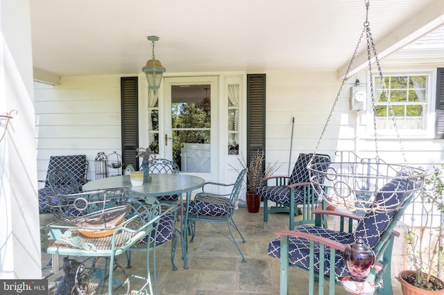 71 Harlingen Rd, Belle Mead, NJ 08502 - view of patio featuring outdoor dining area and covered porch