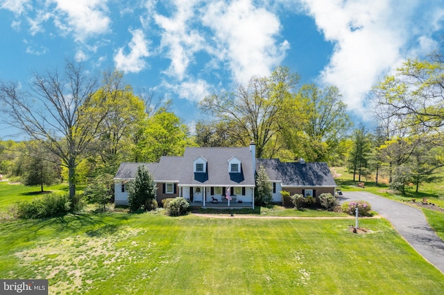 71 Harlingen Rd, Belle Mead, NJ 08502 - cape cod home featuring covered porch, aphalt driveway, a chimney, and a front yard