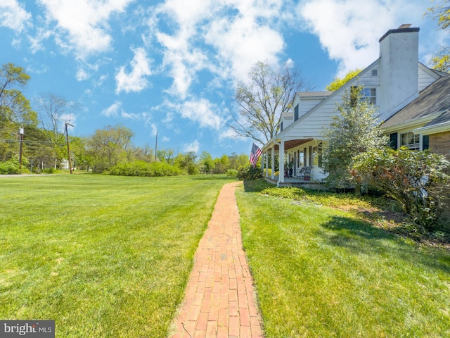 71 Harlingen Rd, Belle Mead, NJ 08502 - view of yard featuring covered porch