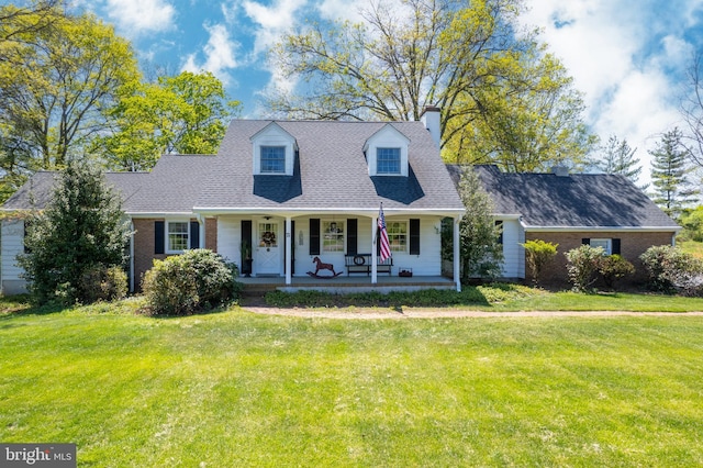 71 Harlingen Rd, Belle Mead, NJ 08502 - new england style home featuring brick siding, a porch, a chimney, and a front yard