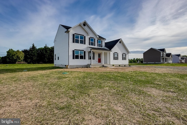 view of front of property with a front lawn