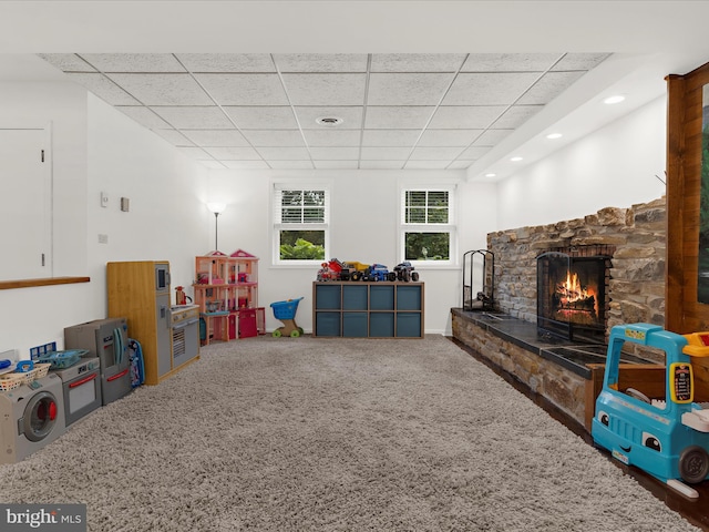 5306 Stone Rd, Frederick, MD 21703 - playroom with carpet floors, a drop ceiling, a fireplace, and recessed lighting