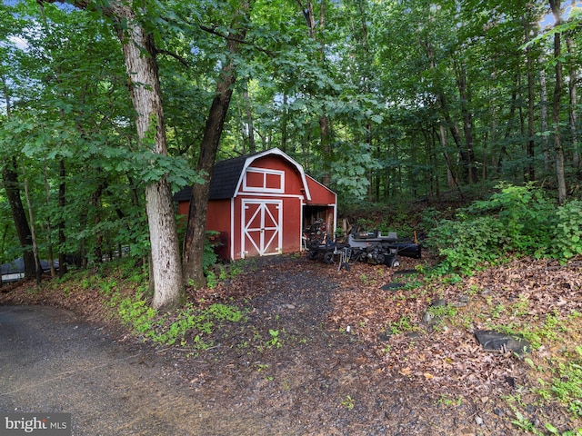 5306 Stone Rd, Frederick, MD 21703 - view of shed featuring a wooded view